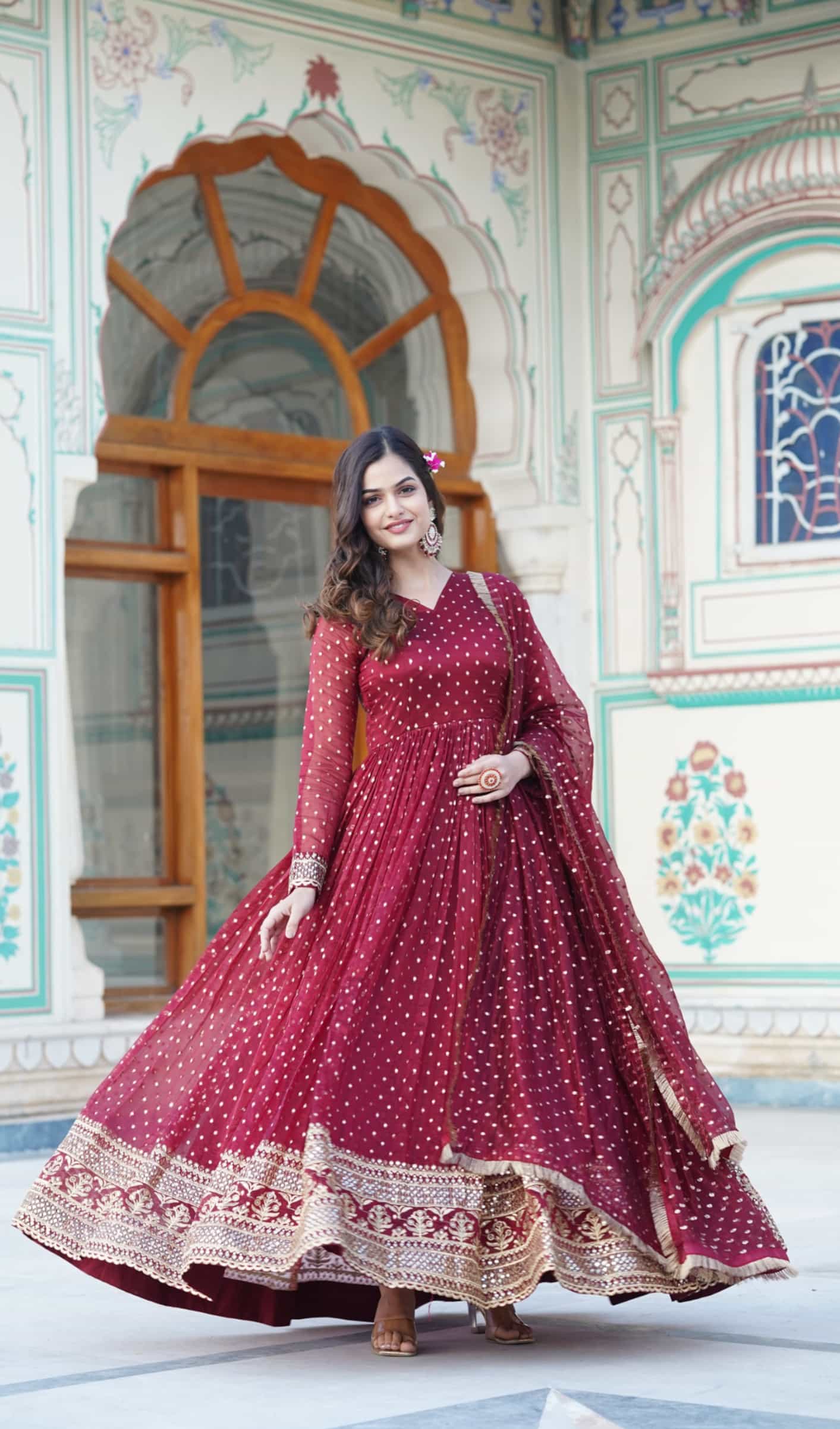 Maroon jacquard butti embroidered gown