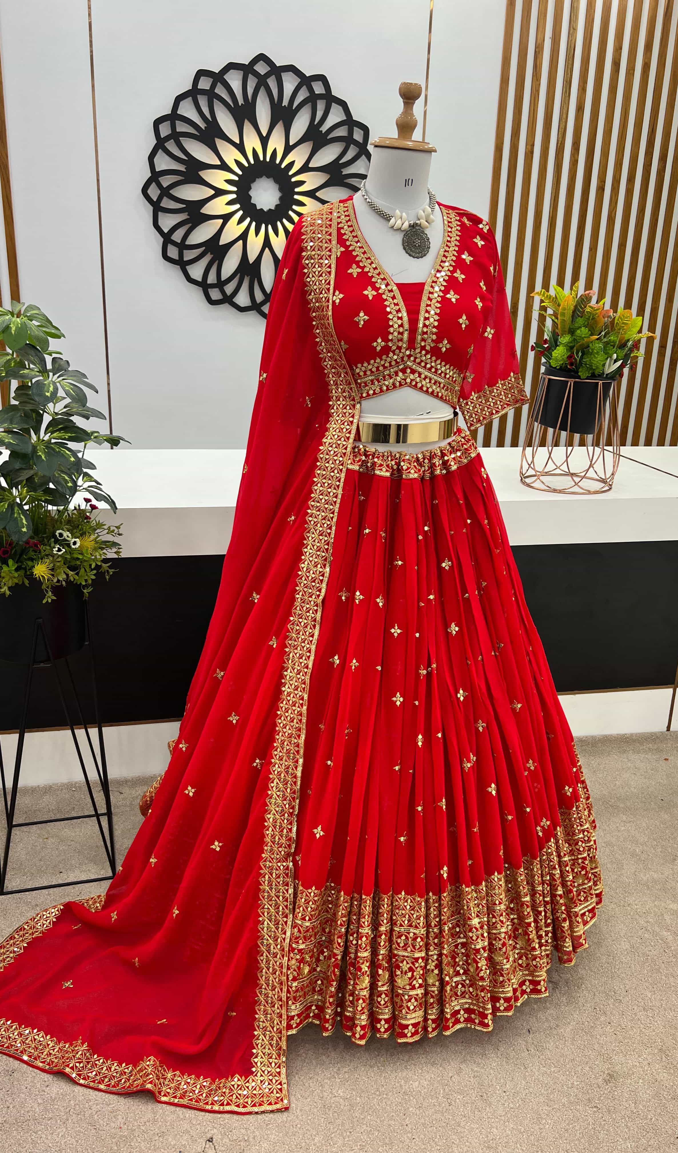 red faux georgette lehenga with heavy embroidery sequence work