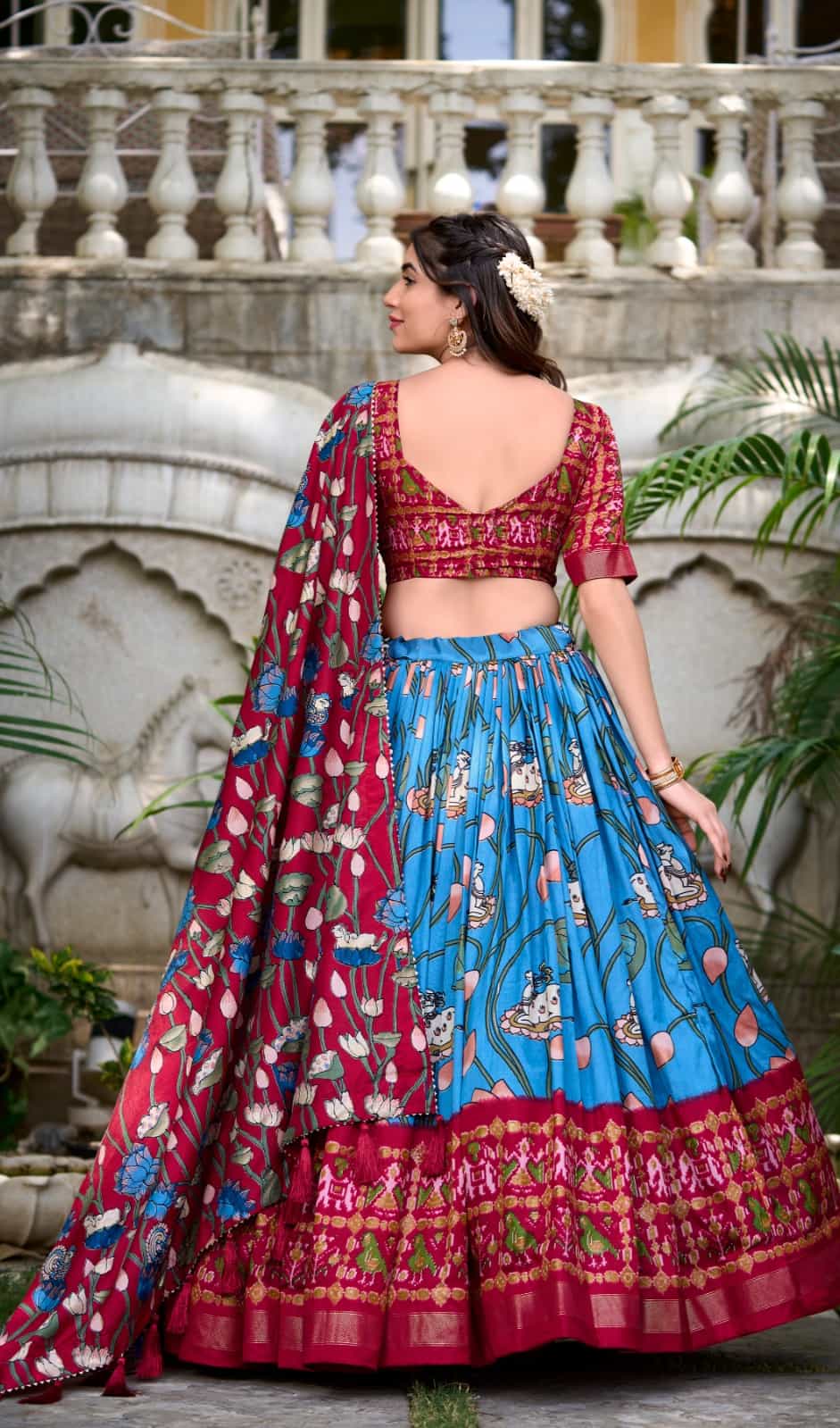 festive and wedding wear blue lehenga with patola print blouse