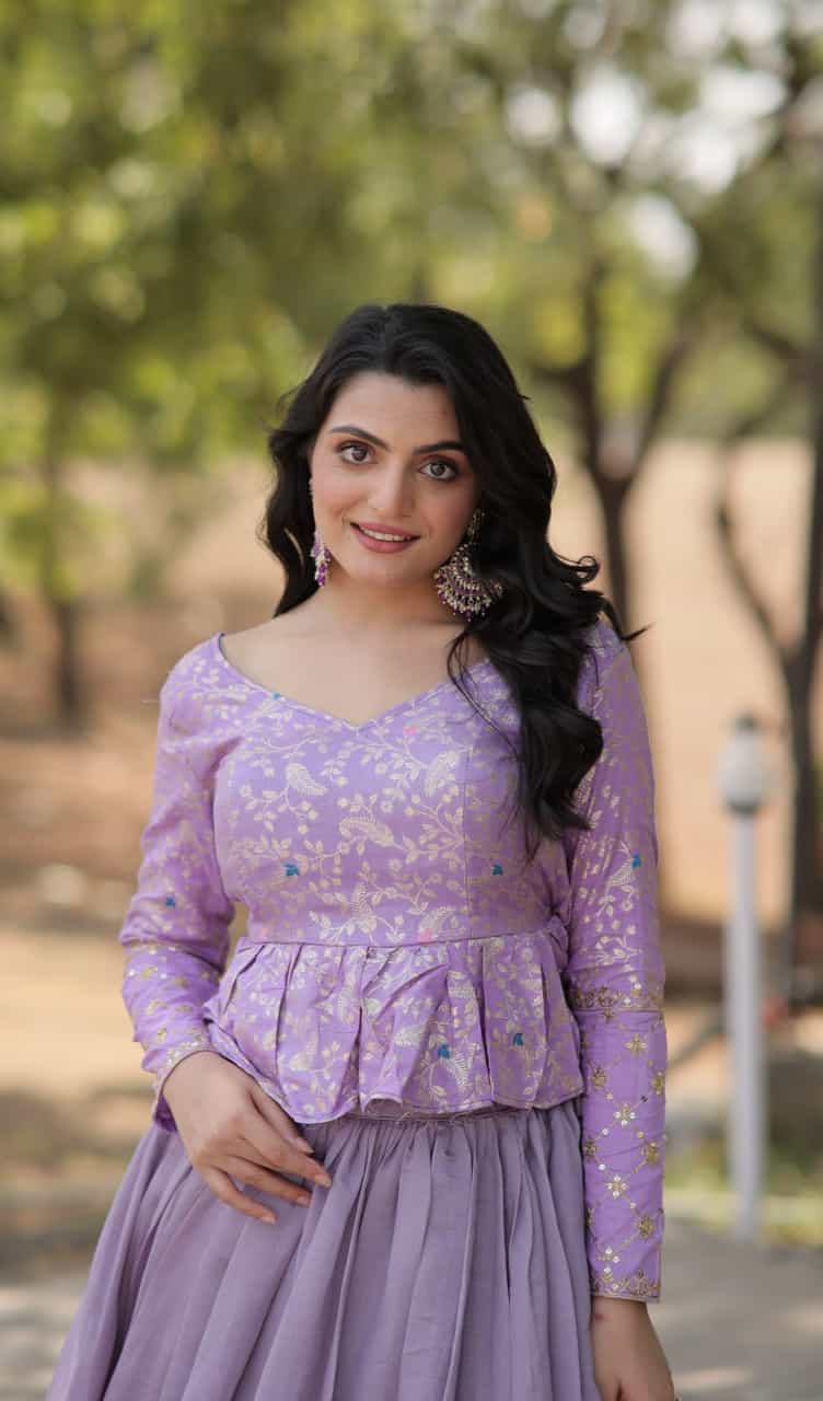 lavender lehenga featuring shimmer Vichitra fabric, cotton lining, zip closure, and a sequined blouse with full sleeves