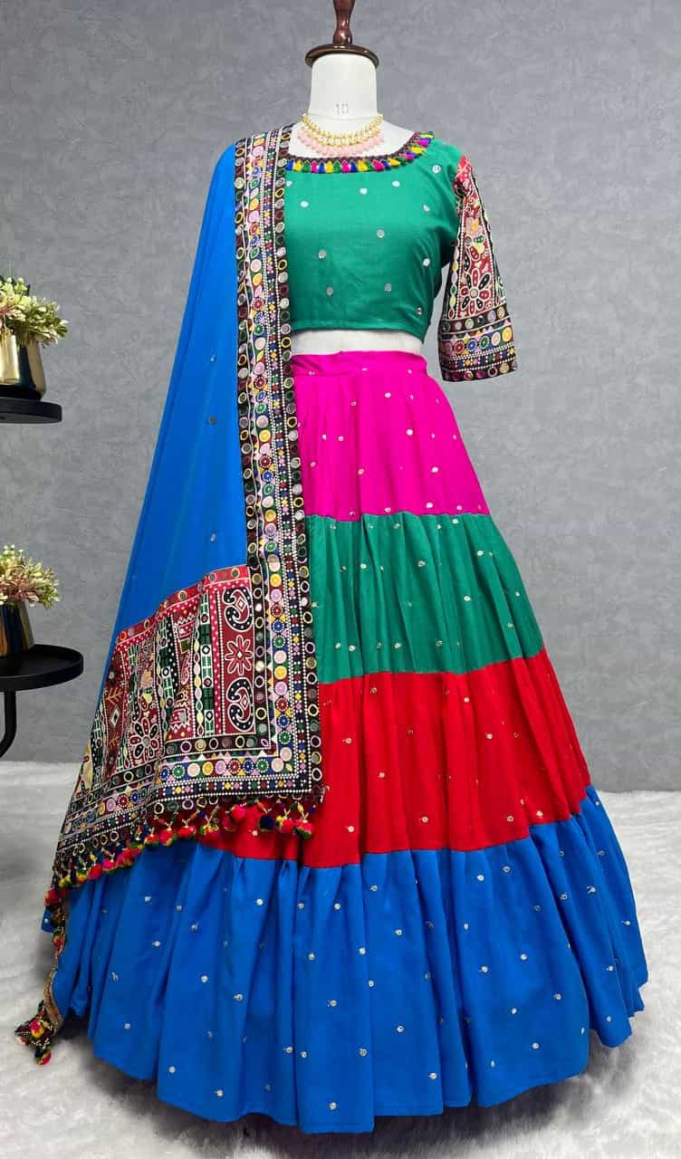 semi-stitched jaipuri lehenga with exquisite embroidery, paired with a mirror-work choli and printed dupatta