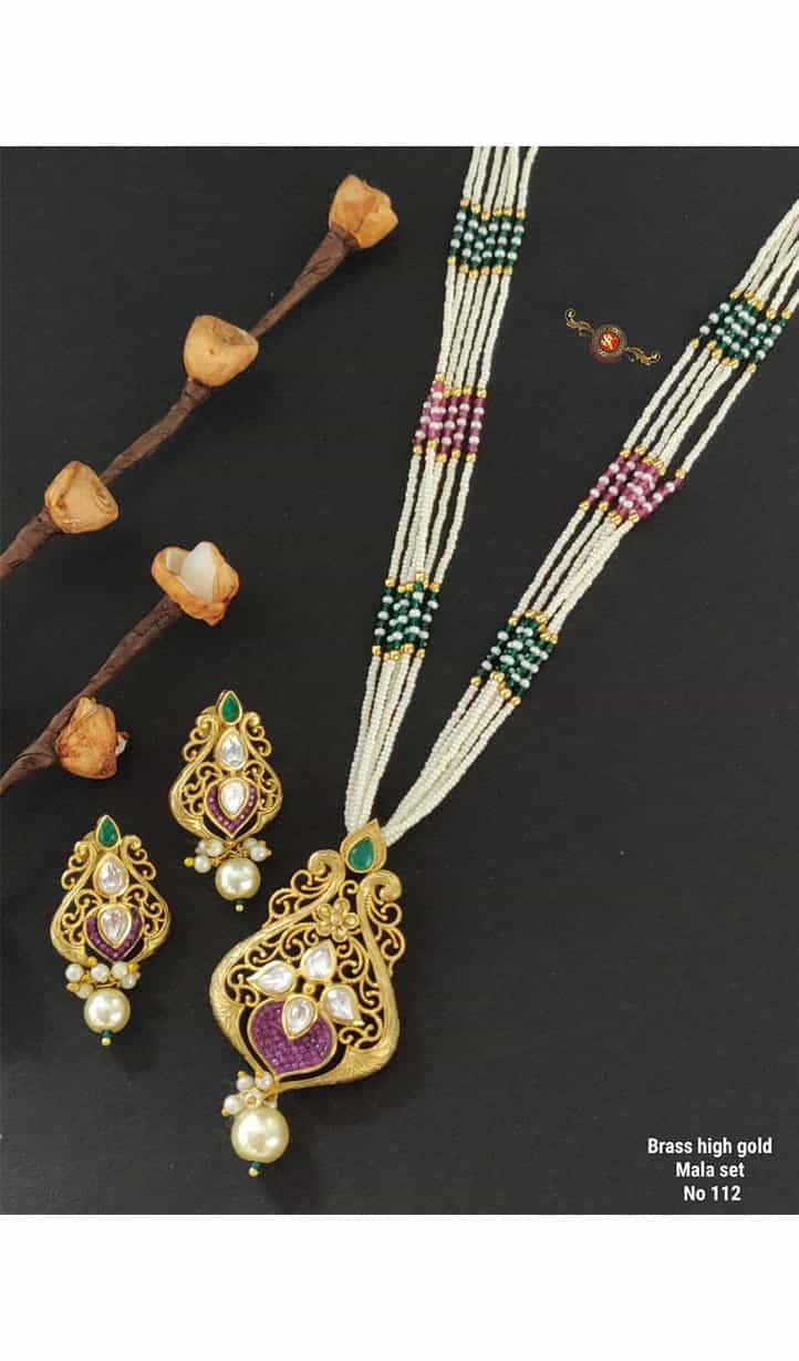 Traditional brass gold necklace with matching earrings