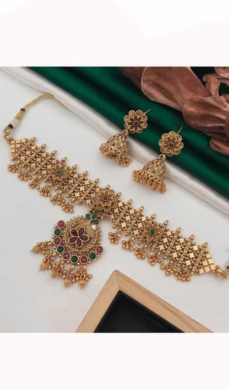 Gold-plated Rajwadi necklace and earrings, perfect for weddings