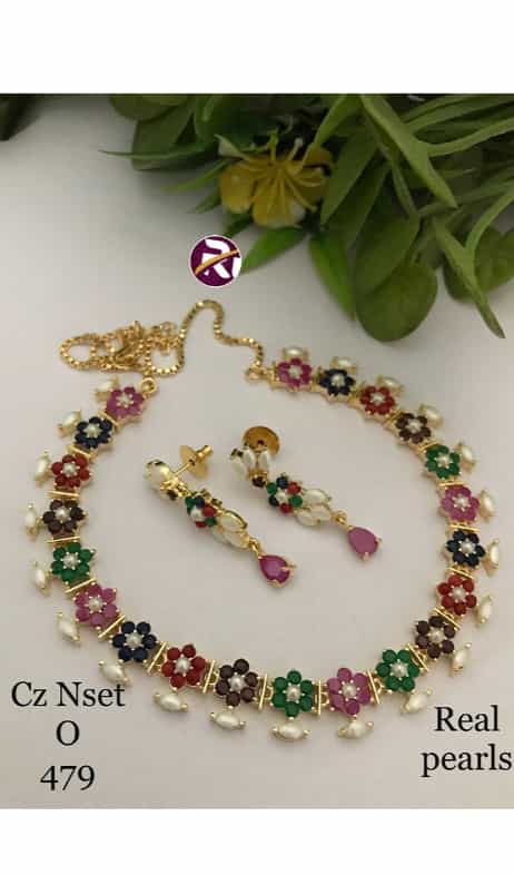 Stylish pearl necklace paired with earrings