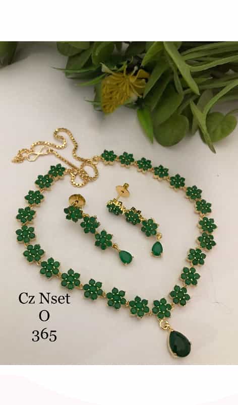 set of green pearl earrings, showcasing the elegance and beauty of natural gemstones