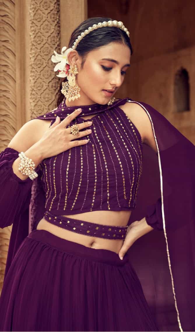 handwork detailing on wine faux georgette lehenga