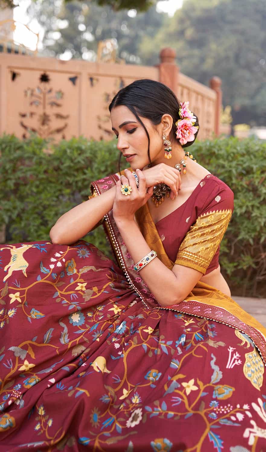 maroon lehenga with cancan and tassels