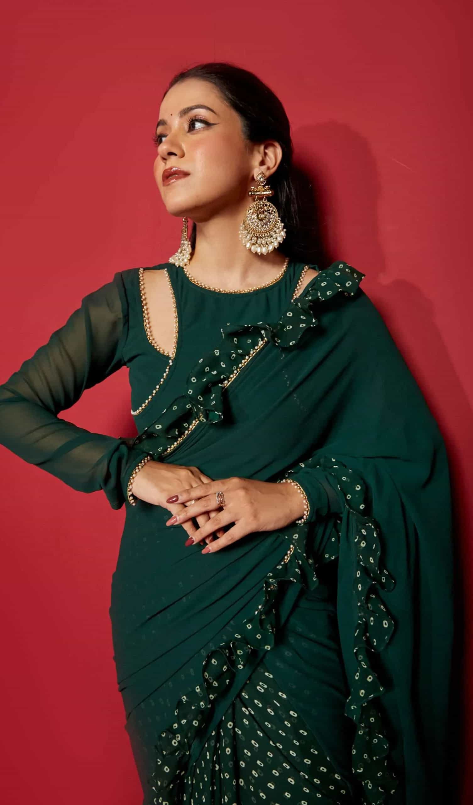 dark green saree contrast blouse