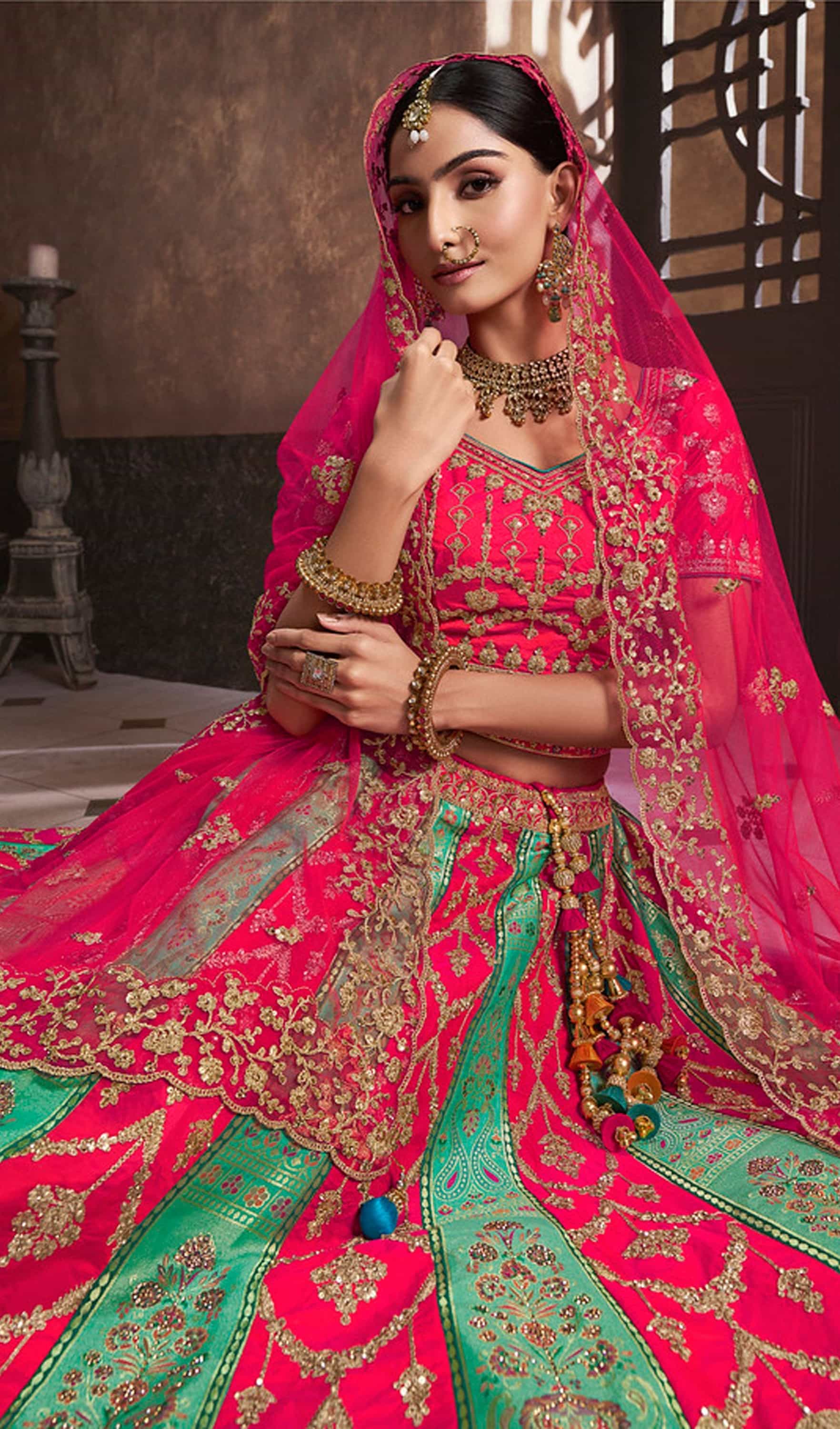 Hot pink lehenga with embroidered blouse and dupatta