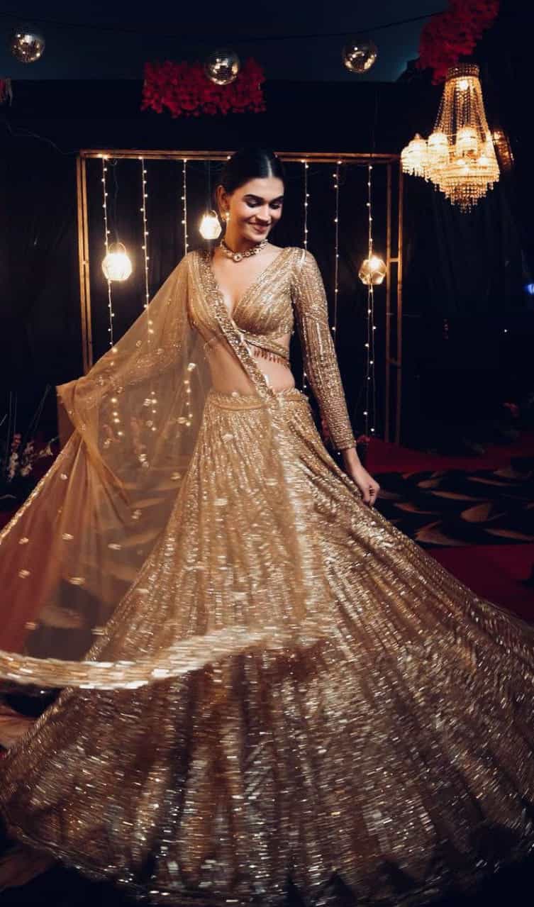 Embroidered lehenga set with net dupatta and tassel border