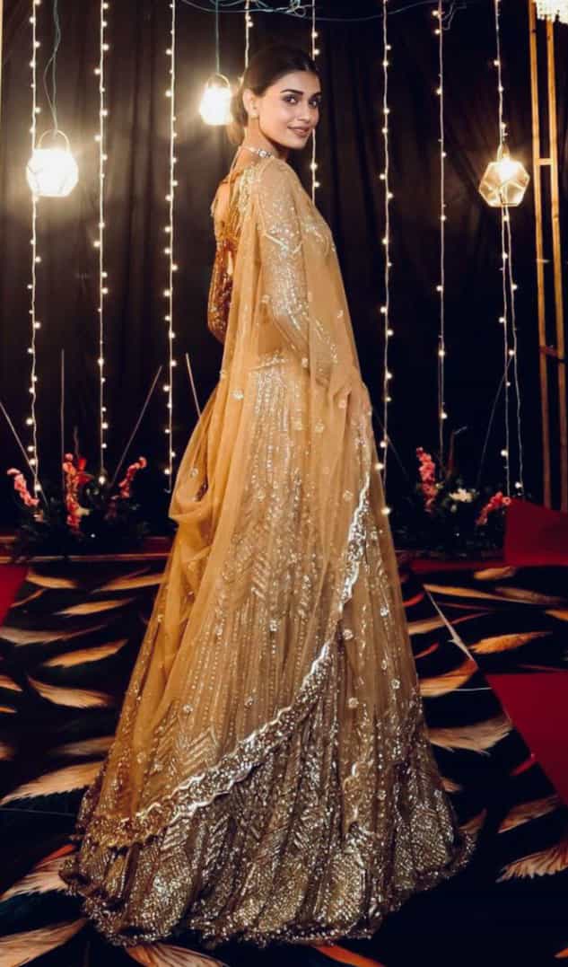Golden Kasturi silk lehenga with sequins and dori work