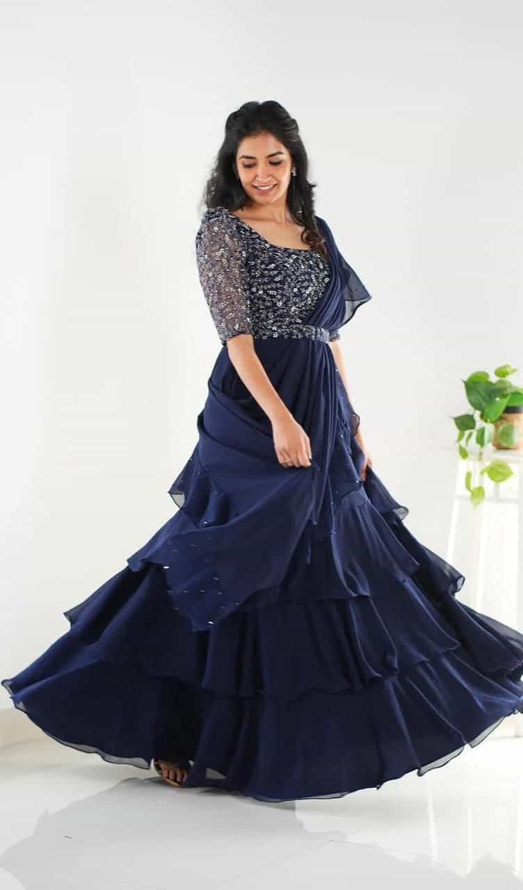 navy blue silk lehenga with intricate embroidery and waist belt