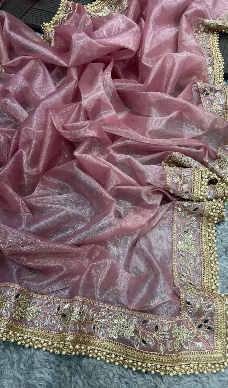 Lavender tissue silk saree with mirror and pearl work