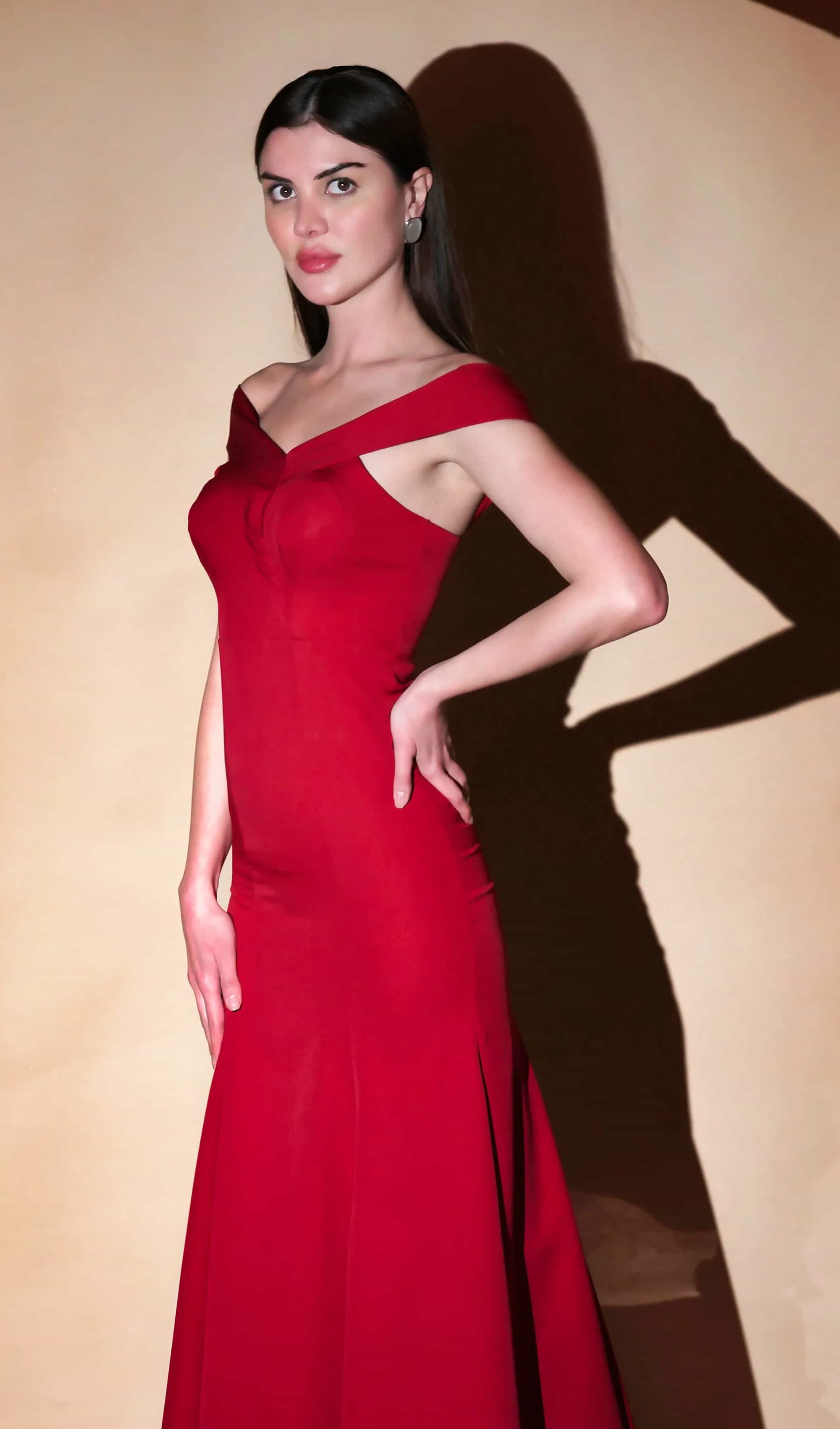 sleeveless red gown with a fitted mermaid silhouette