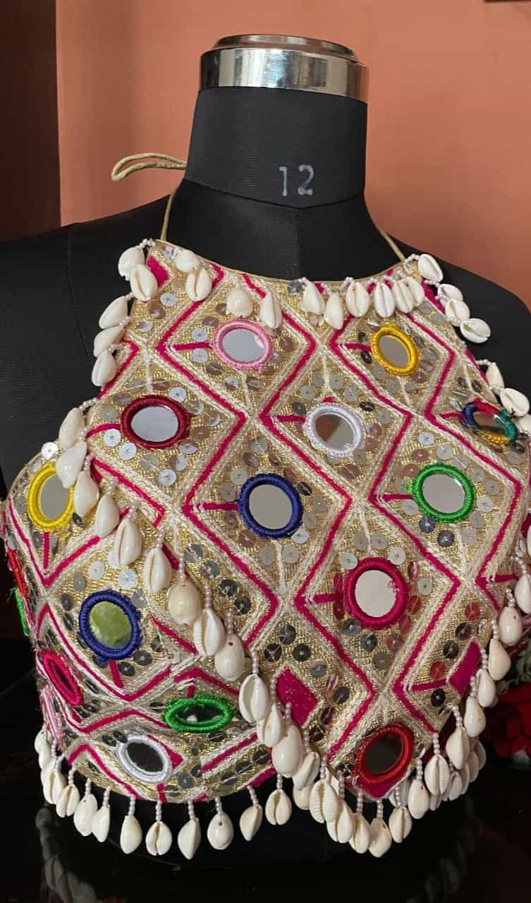 Trendy beige blouse with back open style and elegant latkan embellishments