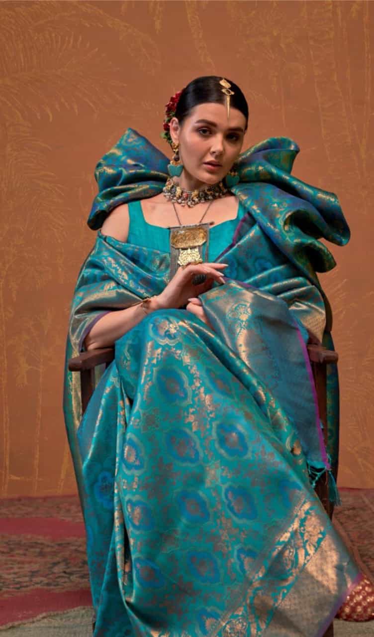 peacock blue silk saree with woven details