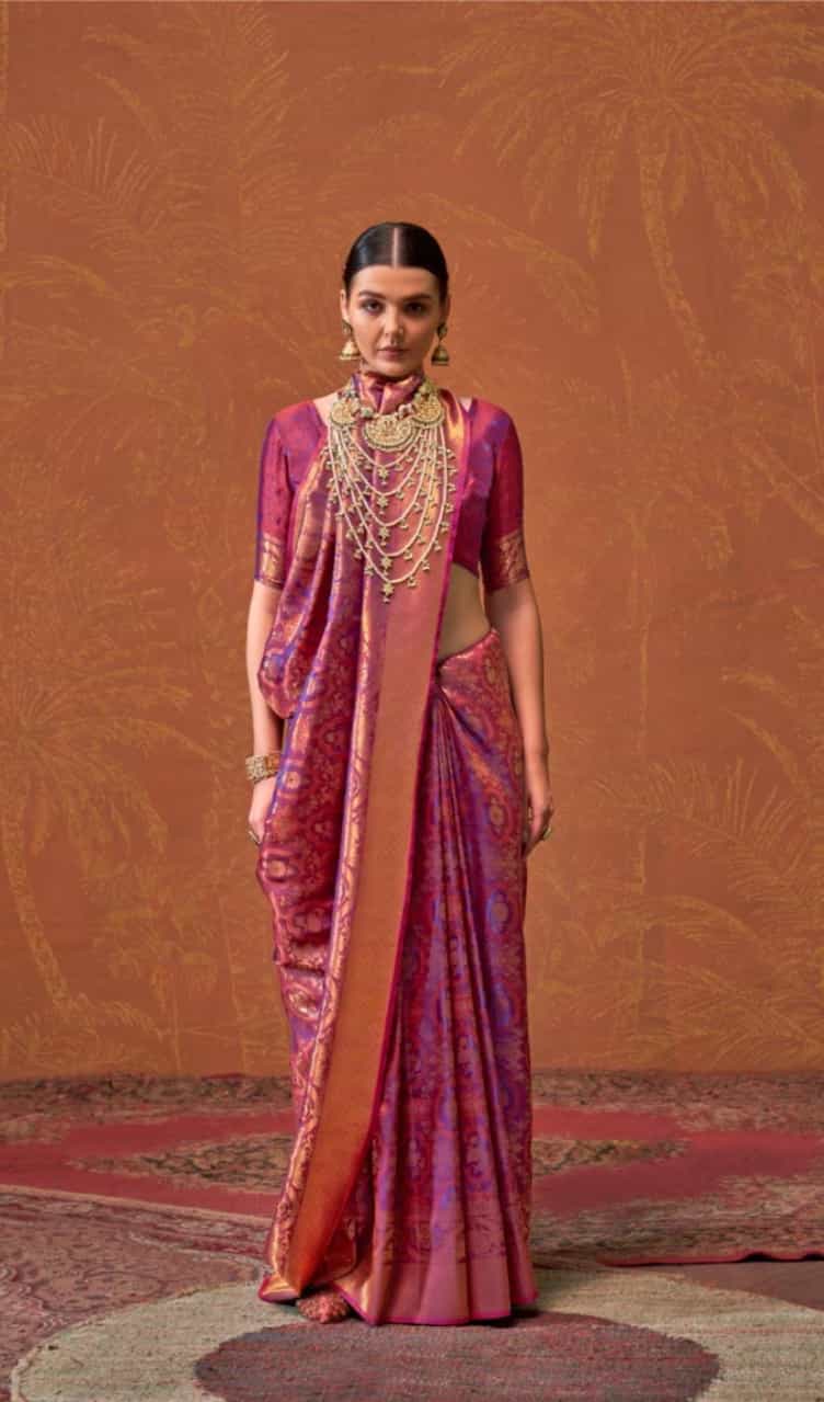 Classic pink handloom silk saree with a graceful touch