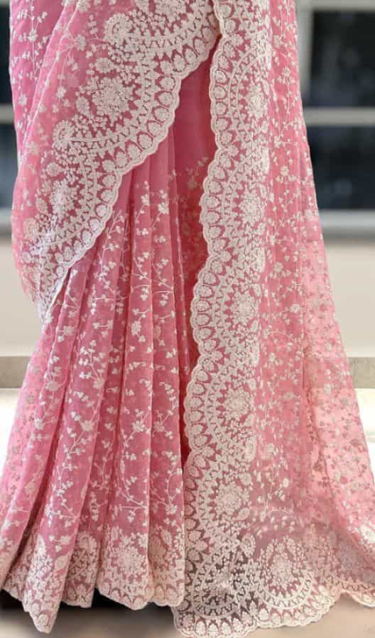 White thread embroidery work