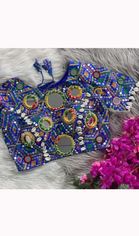 Designer dark blue blouse with 10-inch attachable sleeves and intricate detailing