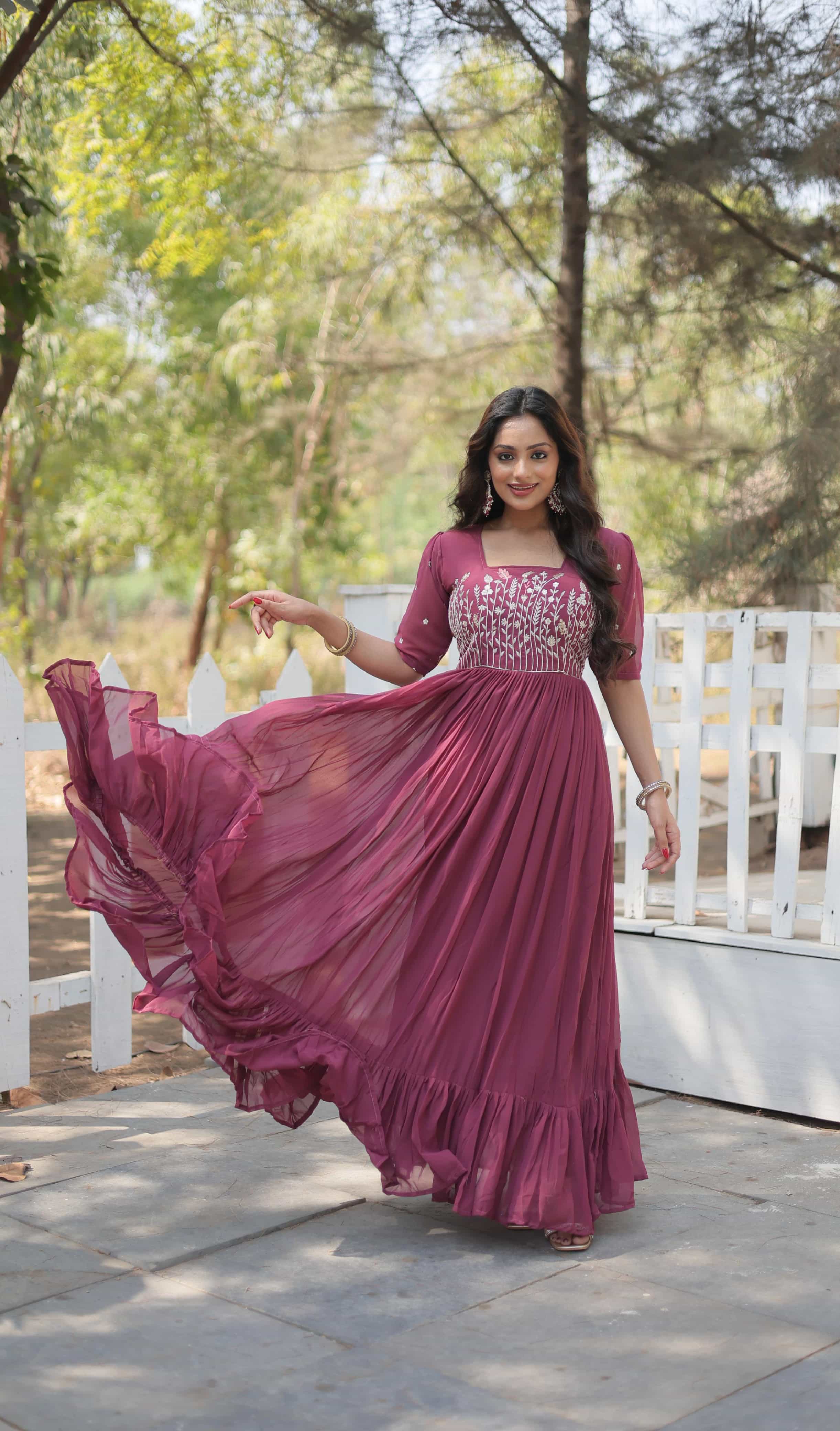 Designer rust pink gown with puff sleeves and square neckline
