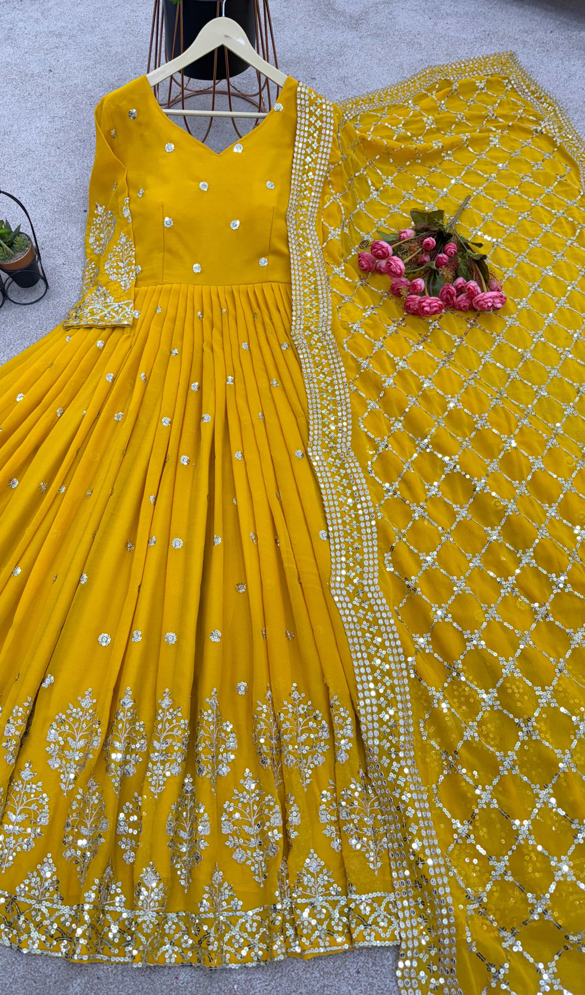 Designer yellow gown with 3-meter flair and soft micro cotton inner lining