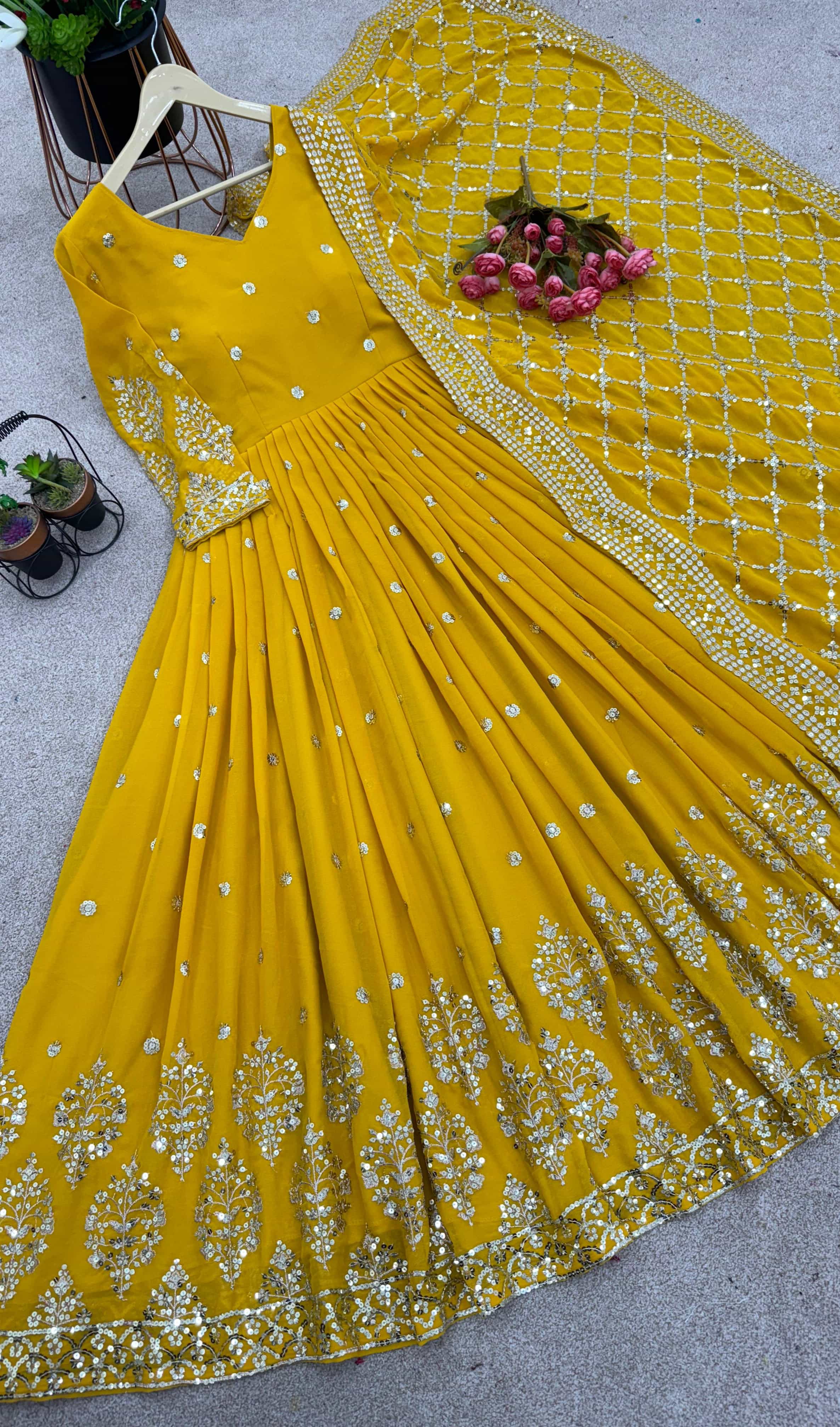 Fully stitched yellow gown with heavy sequence embroidery and dupatta