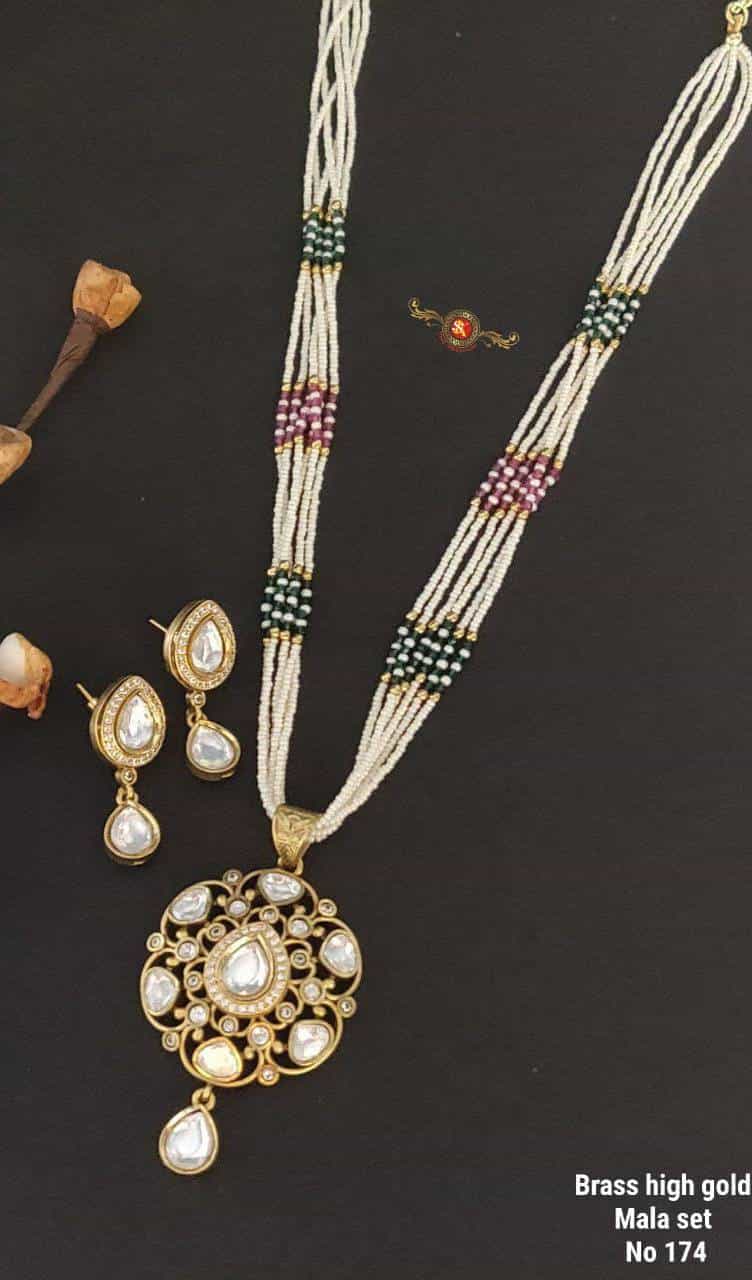 brass gold mala set with teardrop pendant