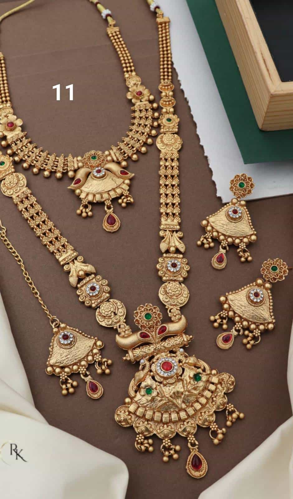 Elegant gold-plated bridal jewelry set with intricate patterns