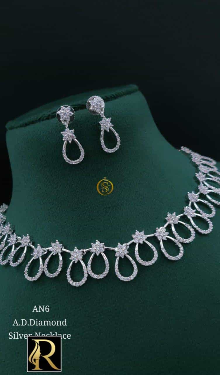 Adjustable American Diamond necklace set in silver plating