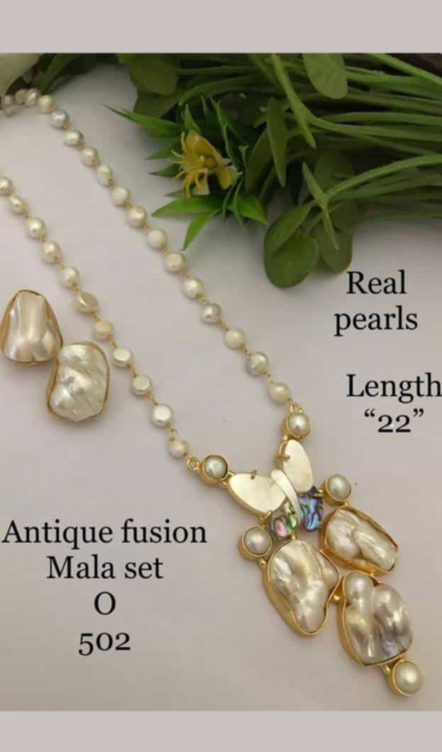 Handcrafted 22-inch antique pearl necklace in white