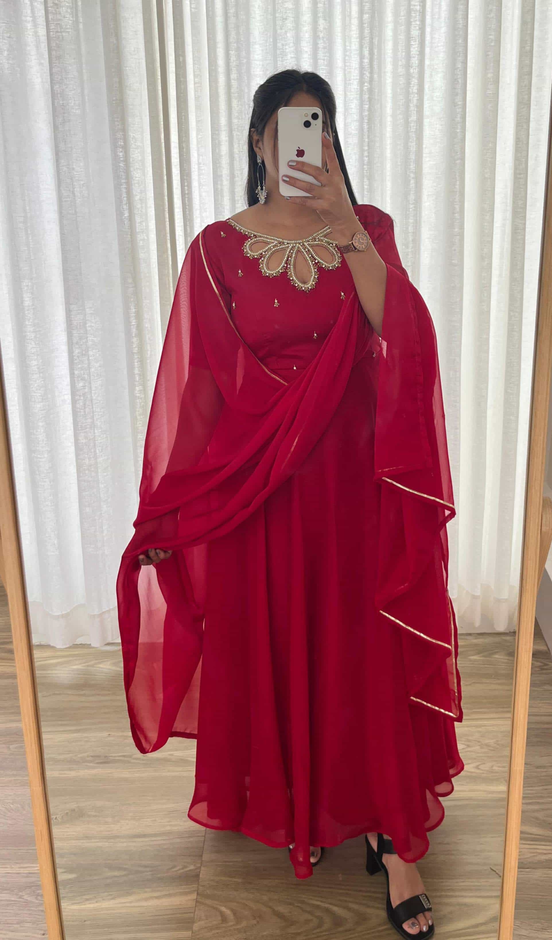 red rangoli gown